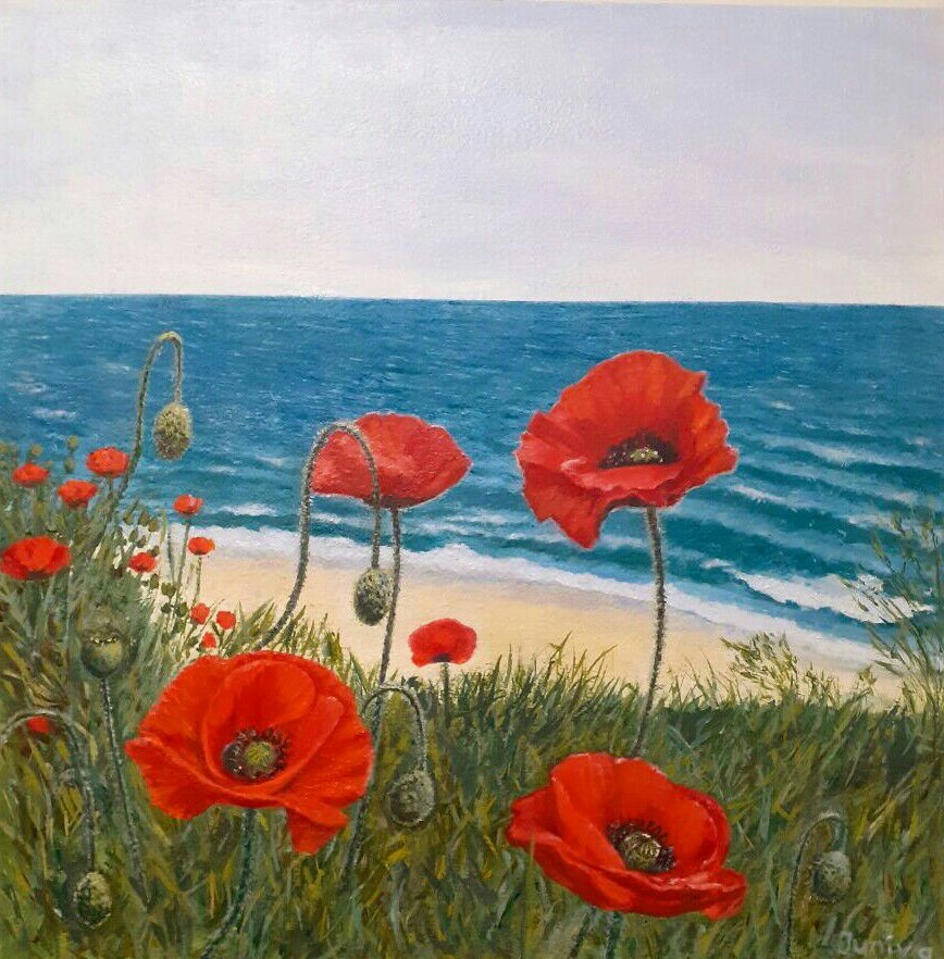 Poppies near the blue sea