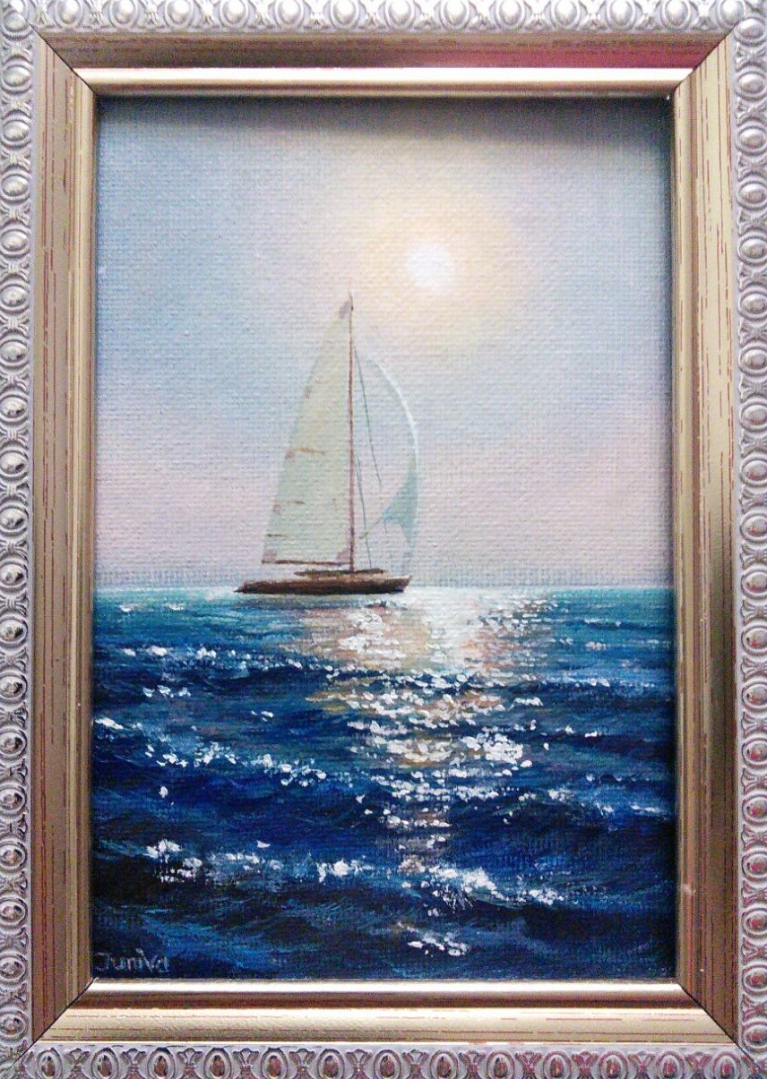 A sailboat at dawn